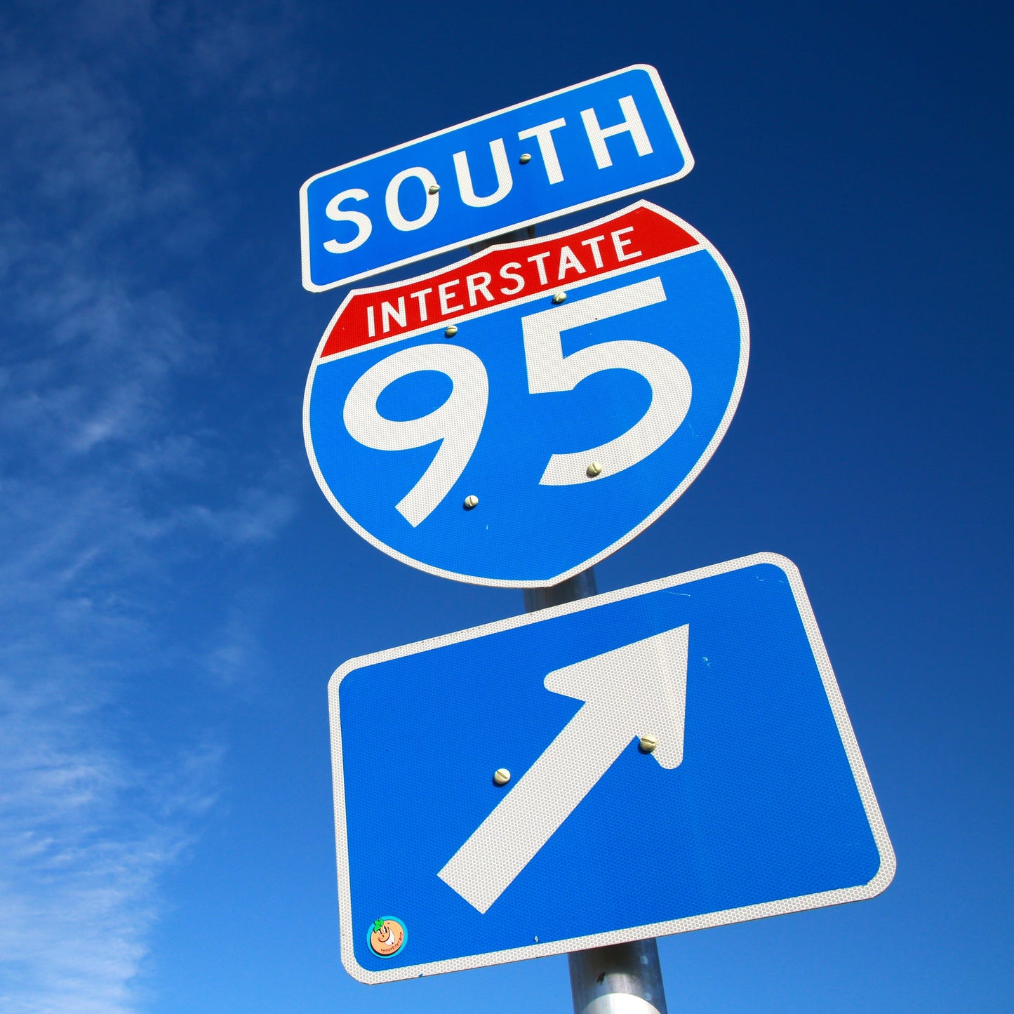 Blue EC and reflective vinyl on interstate sign